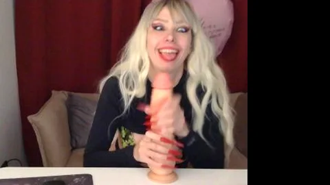 Ahegao face. suck and stroke a huge toy with 2 hands